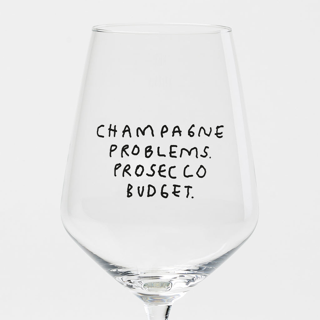 "Champagne Problems. Prosecco Budget." Weinglas