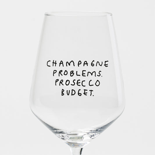 "Champagne Problems. Prosecco Budget." Weinglas