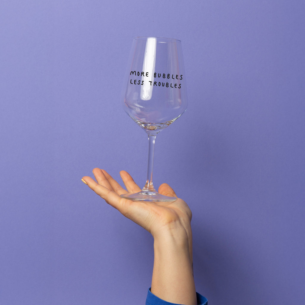 "More Bubbles Less Troubles" Weinglas